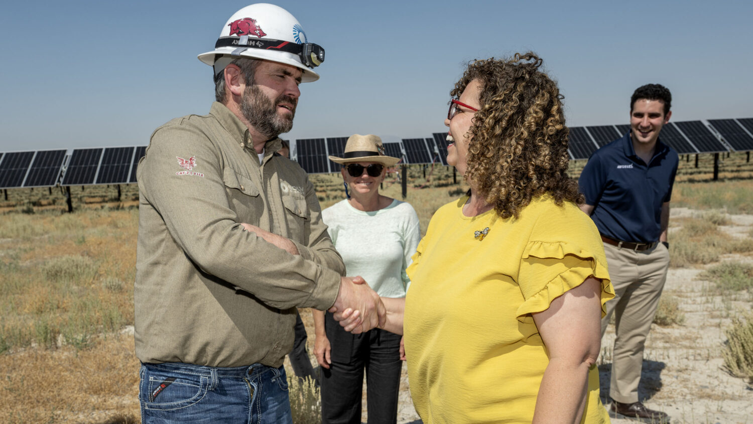 Jonathan Schilling, field service lead for Solv Energy, shakes hands with Rep. Celeste Maloy, R-Utah, as she joins industry leaders and community stakeholders as Solv Energy visits the Desri Horseshoe site in Tooele County as they showcase innovation and investment in the energy sector on Monday, Aug. 3, 2026. During her tour, Rep. Celeste Maloy, R-Utah, described the competing realities of renewable energy, which she said are public desire and Congressional hesitation. (Scott G Winterton, Deseret News)