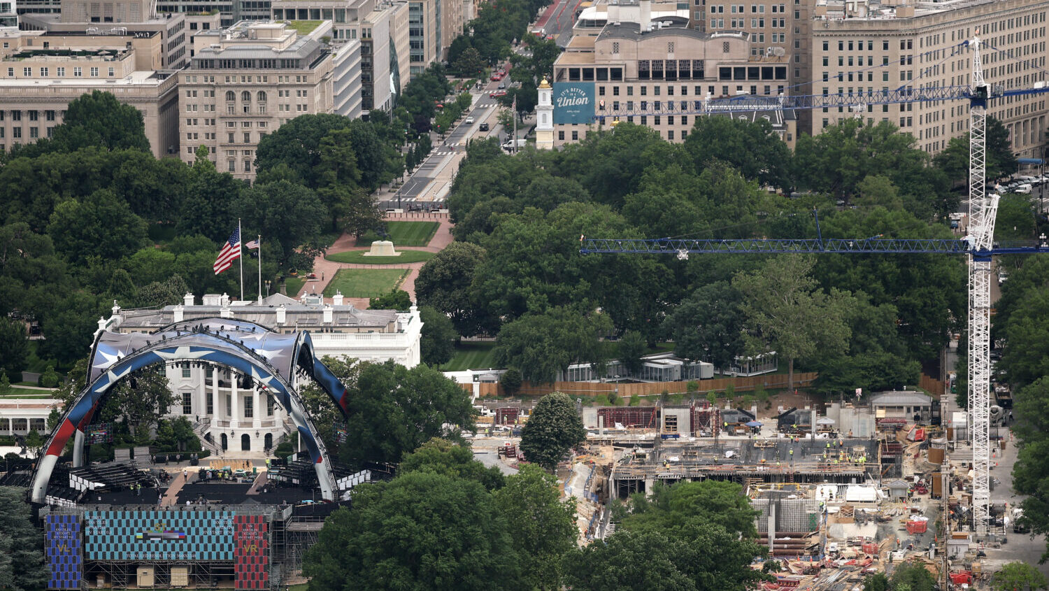 Preparations continue for the Ultimate Fighting Championship Freedom 250 event on the White House South Lawn as well as construction on the White House State Ballroom (R) on June 08, 2026 in Washington, DC. (Win McNamee, Getty Images)