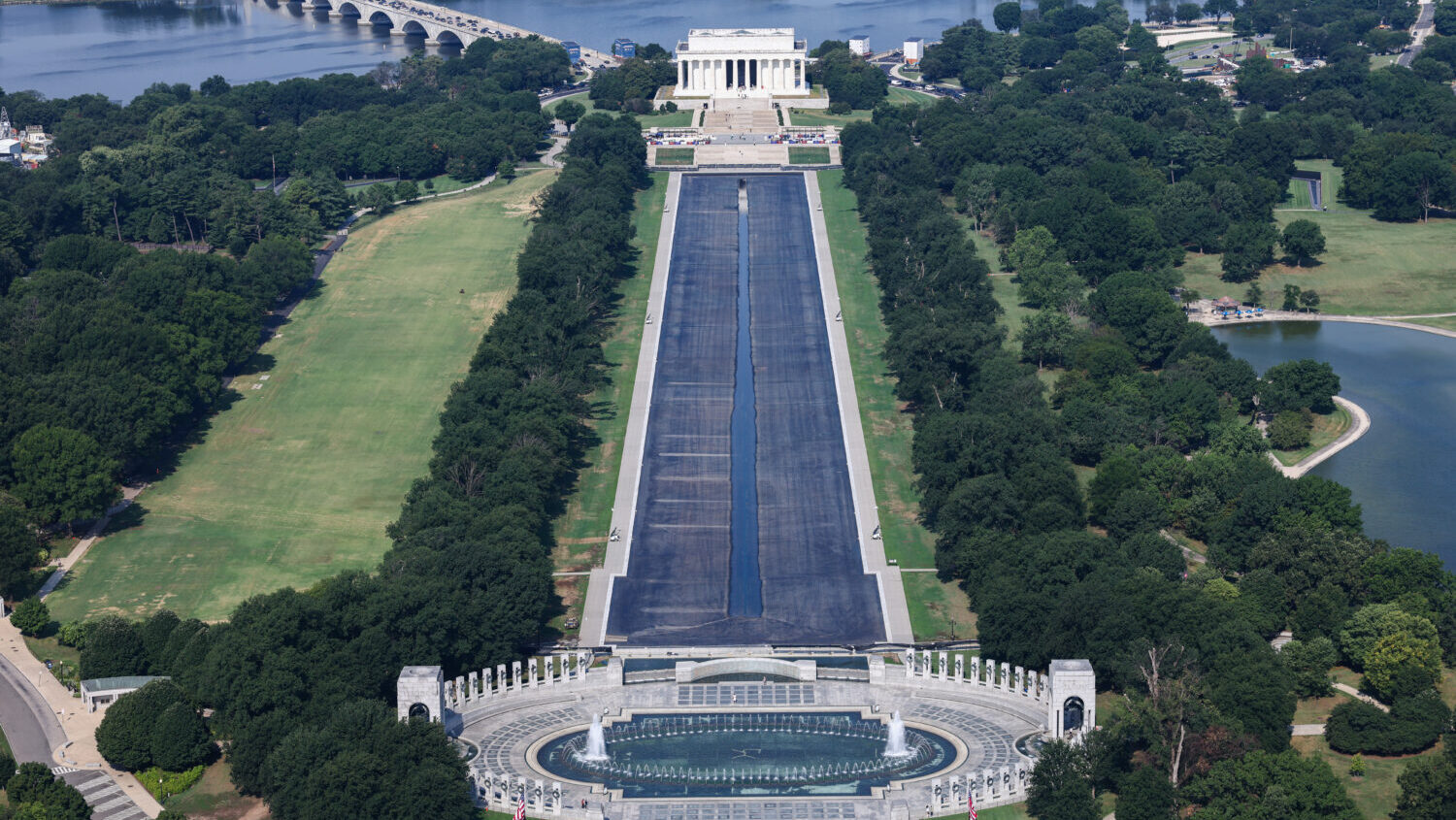 The drained Reflecting Pool and Lincoln Memorial are seen on the National Mall on July 22, 2026 in Washington, DC. President Trump ordered the pool to be drained for repairs after the project was allegedly vandalized. (Finn Gomez, Getty Images)