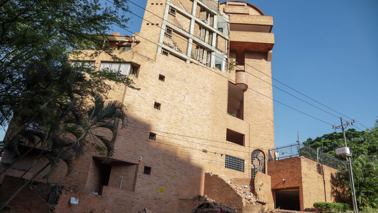 A partially collapsed building at the Bellavista neighborhood after a magnitude 7.4 earthquake struck Colombia on August 10, 2026 in Cali, Colombia. President of Colombia Abelardo de la Espriella confirmed over 100 deaths after buildings collapsed in the southern region of Colombia. The USGS put the earthquake at a 7.4 magnitude. (Samir Rojas, Getty Images)