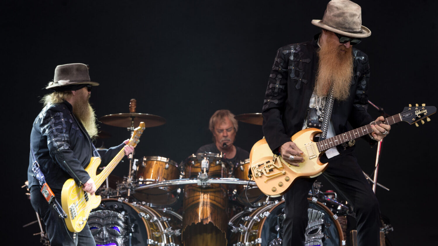 FILE: (L-R) Dusty Hill, Frank Beard and Billy Gibbons of ZZ Top perform on the Pyramid Stage during the Glastonbury Festival at Worthy Farm, Pilton on June 24, 2016 in Glastonbury, England. (Ian Gavan, Getty Images)