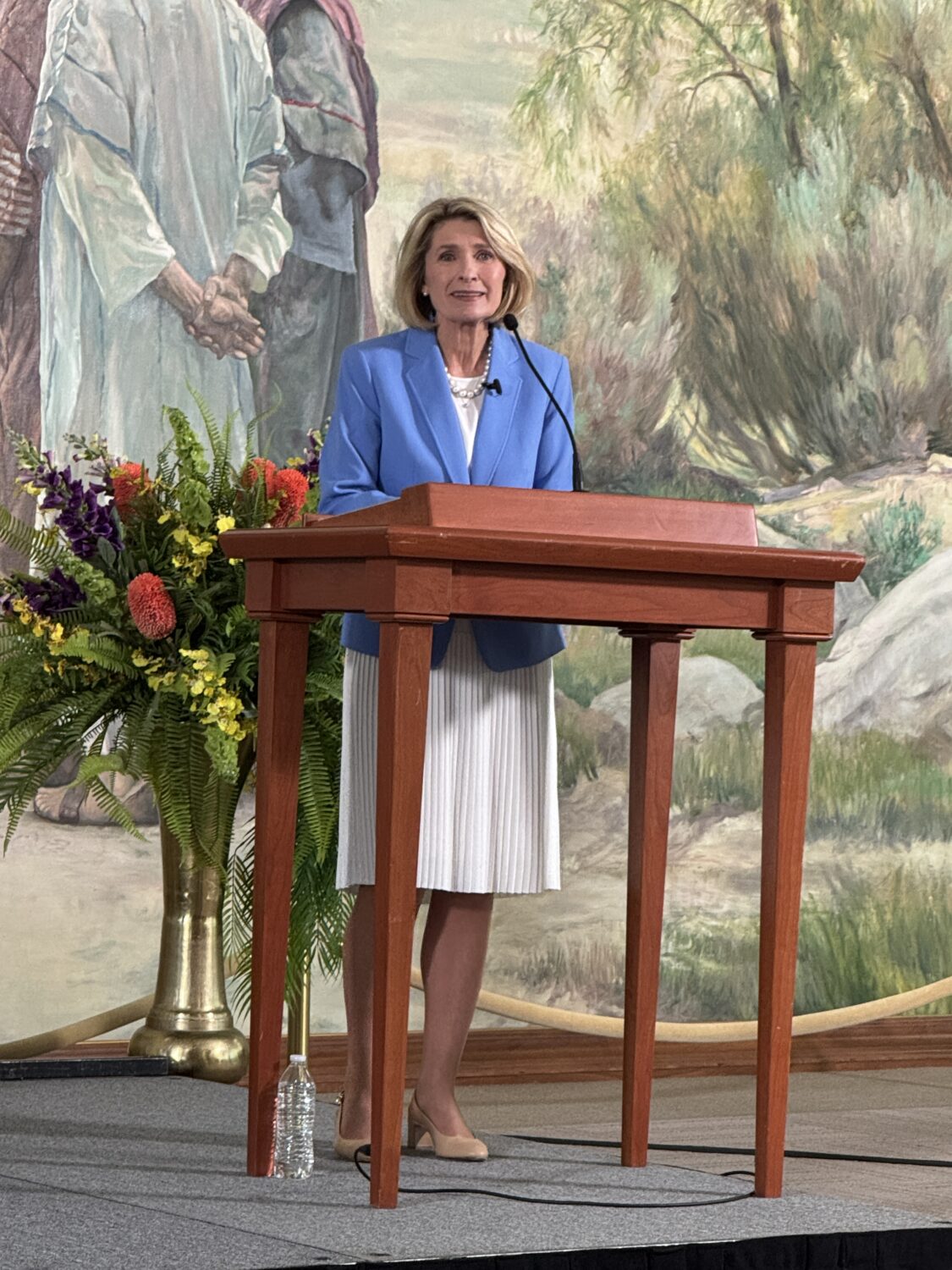 <em>General Relief Society Pres. Camille N. Johnson announces an additional $65 million from The Church of Jesus Christ of Latter-day Saint to continue the work of the Caring for Women and Children Initiative Consortia. (Photo credit: Holly Richardson, KSL)</em>