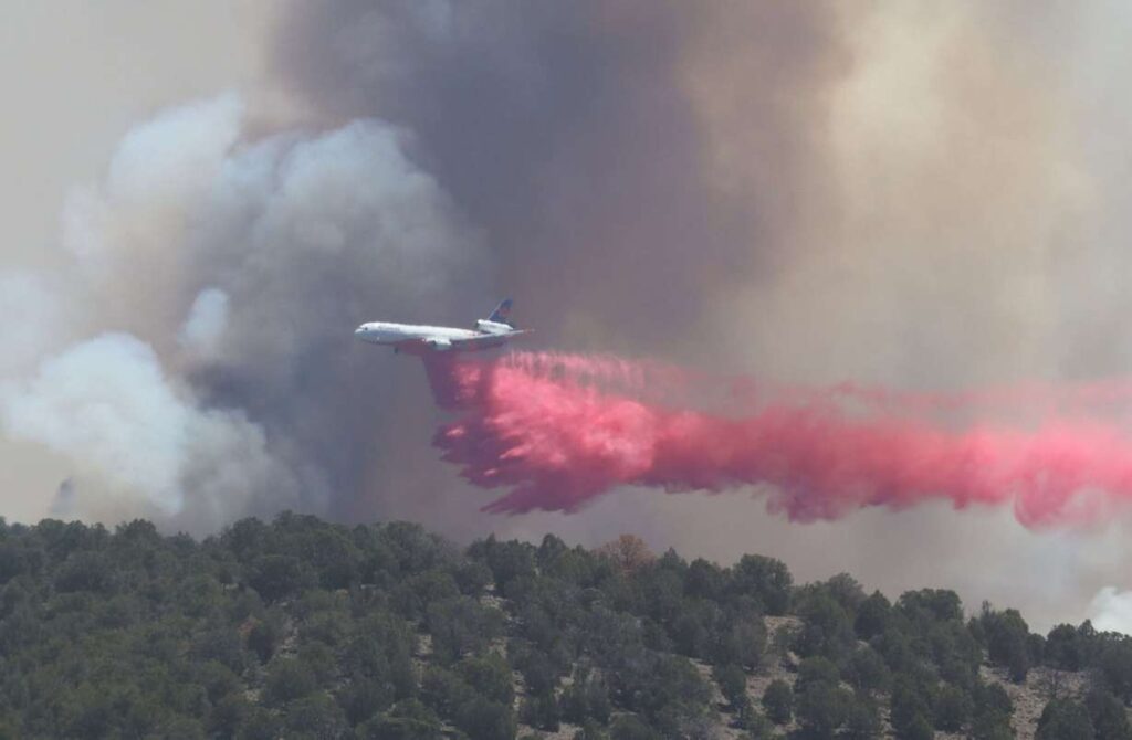 A plane does a retardant drop on the Cottonwood Fire in the Fishlake National Forest on June 23. The fire is one of several torching the Western U.S. in a record-breaking wildfire season that is grabbing the attention of Congress. (Photo: U.S. Forest Service)