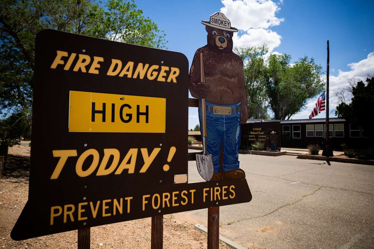 A sign indicating wildfire danger is located outside the Kaibab National Forest North Kaibab Ranger District office in Fredonia, Ariz., on May 16. Congress is pushing to get the Fix Our Forests Act over the finish line. (Photo: Tess Crowley, Deseret News)