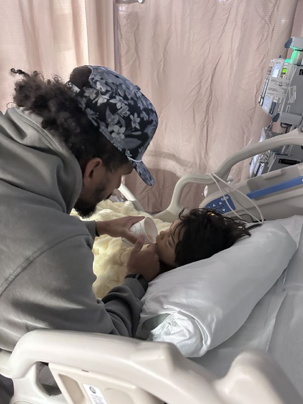 Zion Silva, 6, is being hailed as a hero after saving his 4-year-old brother, Leo, from falling from a two-story window. Sadly, Zion is in the hospital recovering from serious injuries that resulting from his own fall. (Carlos Silva)