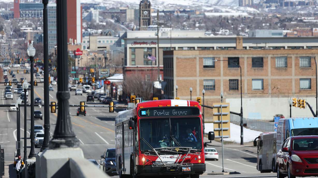 FILE: A UTA bus travels on 400 South in Salt Lake City on March 10, 2022. The agency is proposing a...