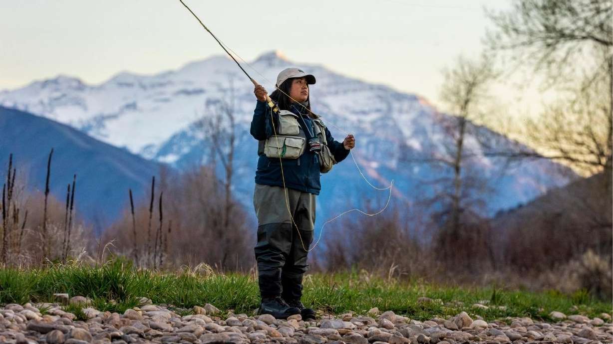 Rebeca Granillo, a fly-fishing instructor from Millcreek, fishes along the Provo River near Charles...
